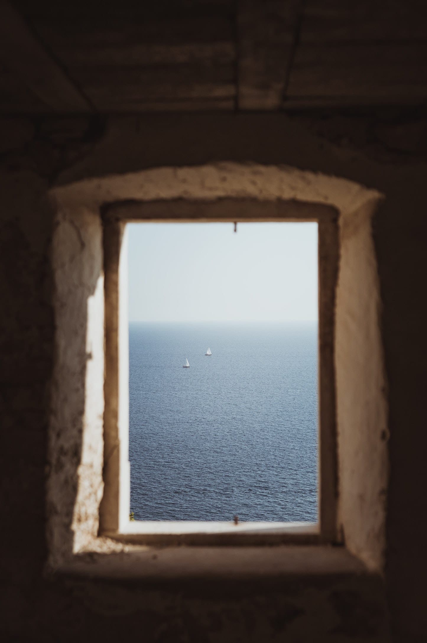 View through a porthole window on a yacht in Croatia
